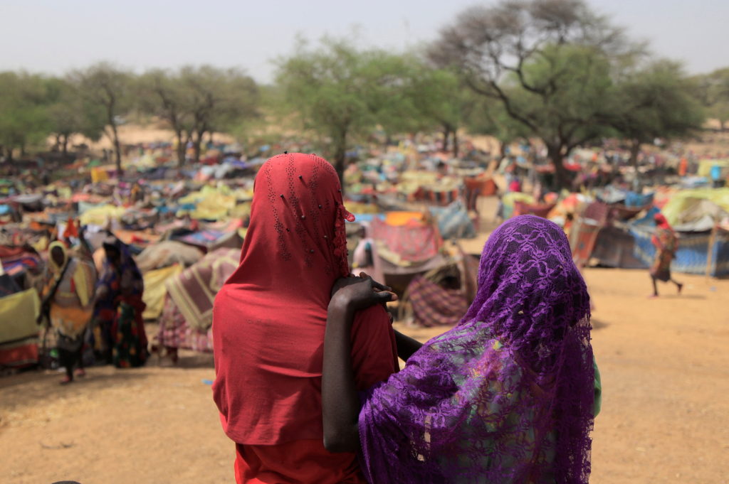 FILE PHOTO: Sudanese girls who fled the conflict in Sudan's Darfur region, and were previously internally displaced in Sud...