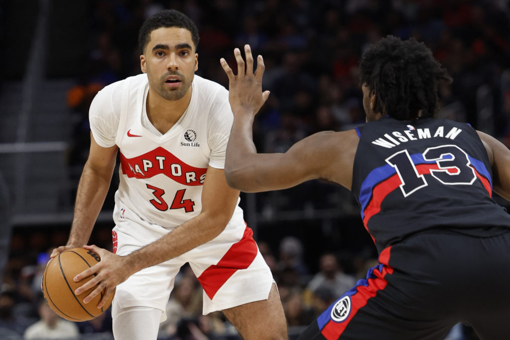 Raptors center Jontay Porter (34) is defended by Detroit Pistons center James Wiseman (13) in the second half at Little Ca...